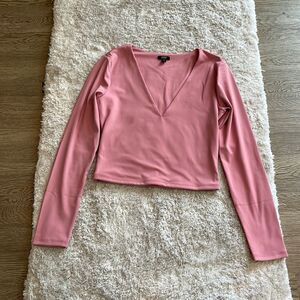 NWOT.  Express pink long sleeve top.  Size small